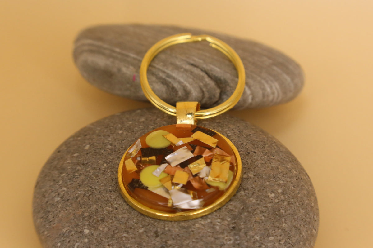 Gold Coloured Stainless Steel Round Keyring With Multicoloured Rubbish & Eco Resin