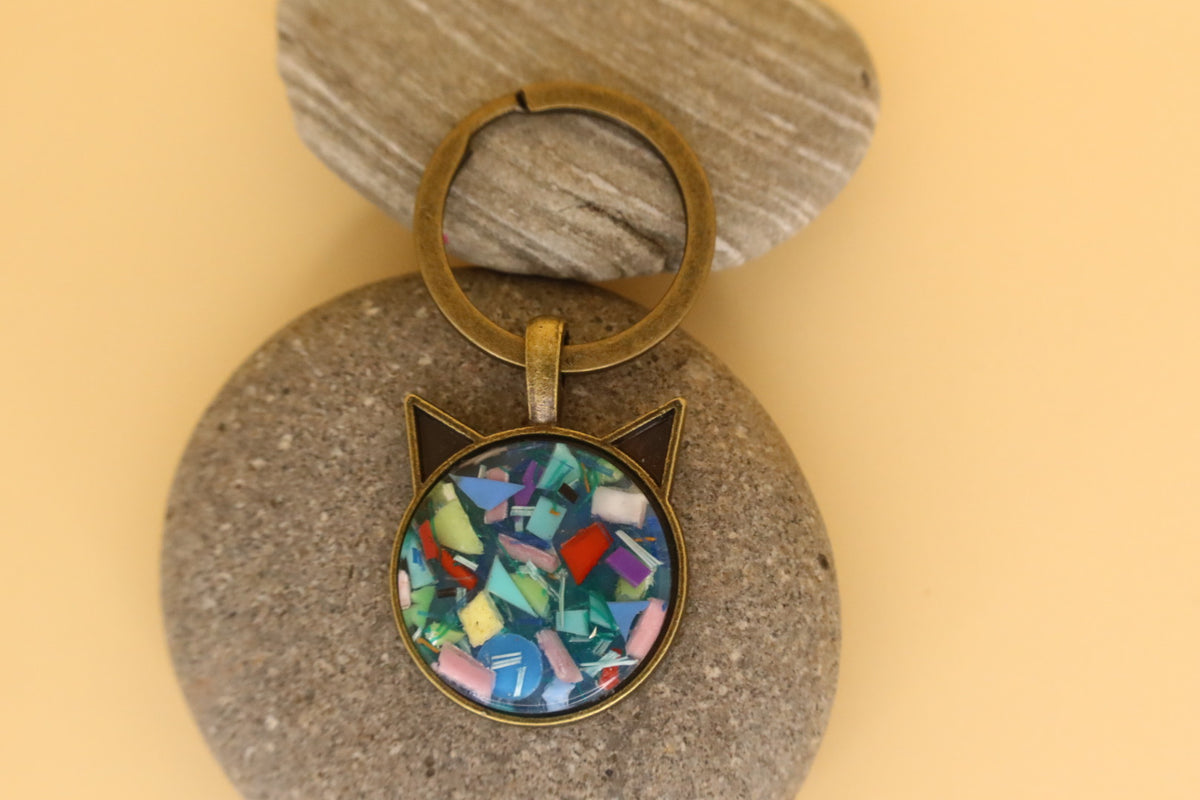 Antique Stainless Steel Pet face Keyring With Beach Clean Rubbish & Eco Resin