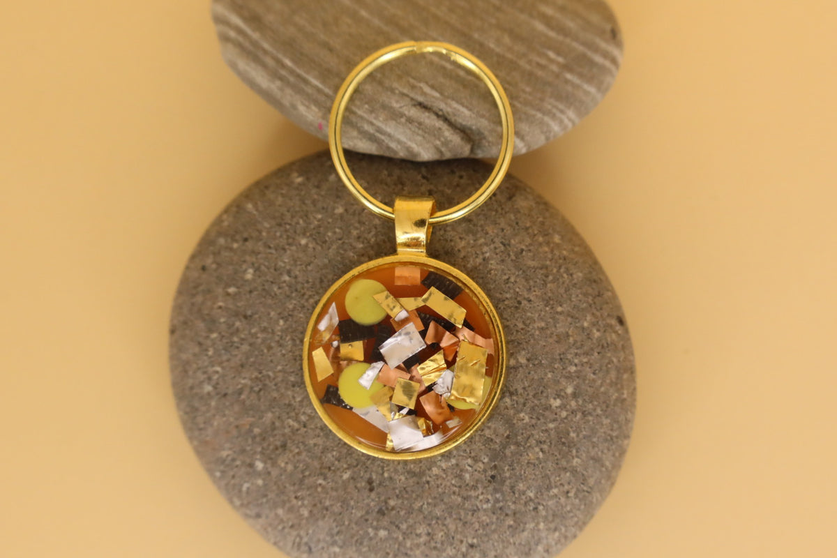 Gold Coloured Stainless Steel Round Keyring With Multicoloured Rubbish & Eco Resin