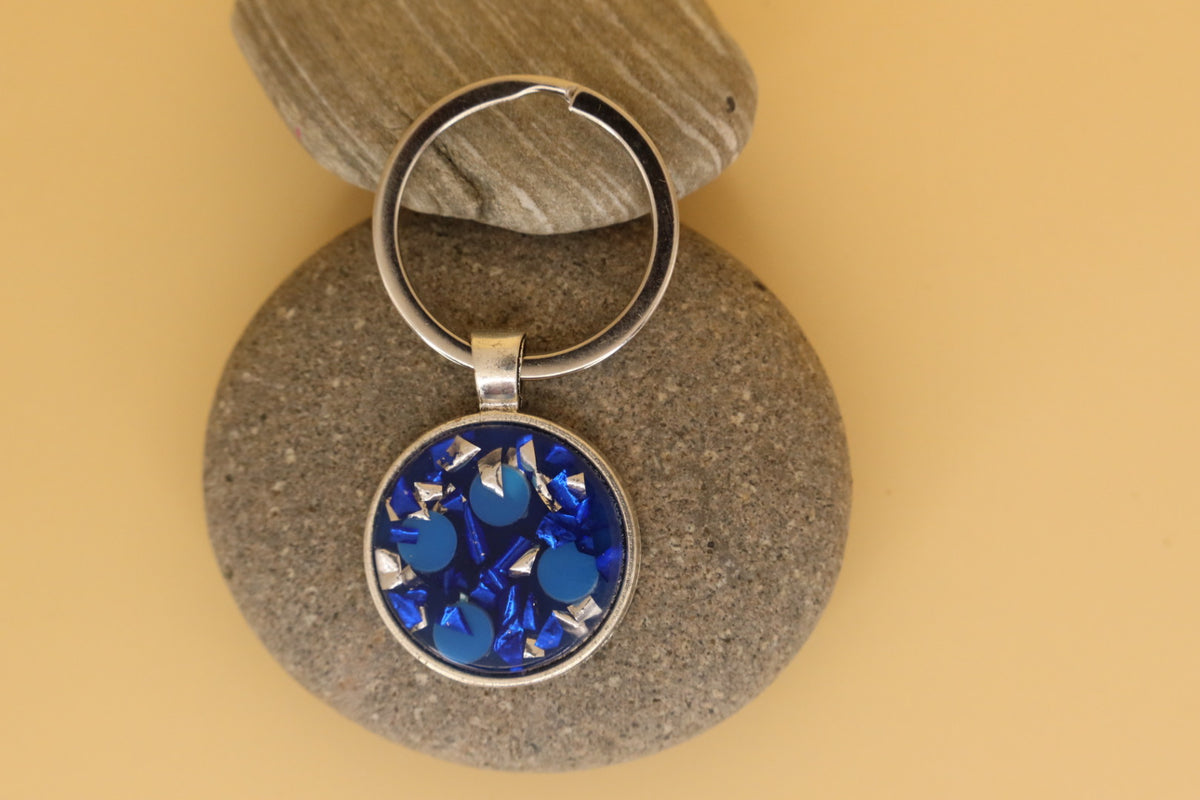 Silver Coloured Stainless Steel Round Keyring With Blue Rubbish & Eco Resin