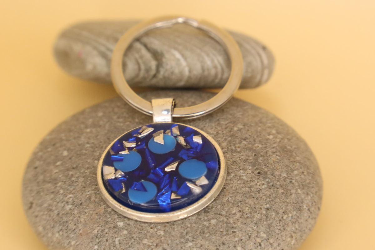 Silver Coloured Stainless Steel Round Keyring With Blue Rubbish & Eco Resin